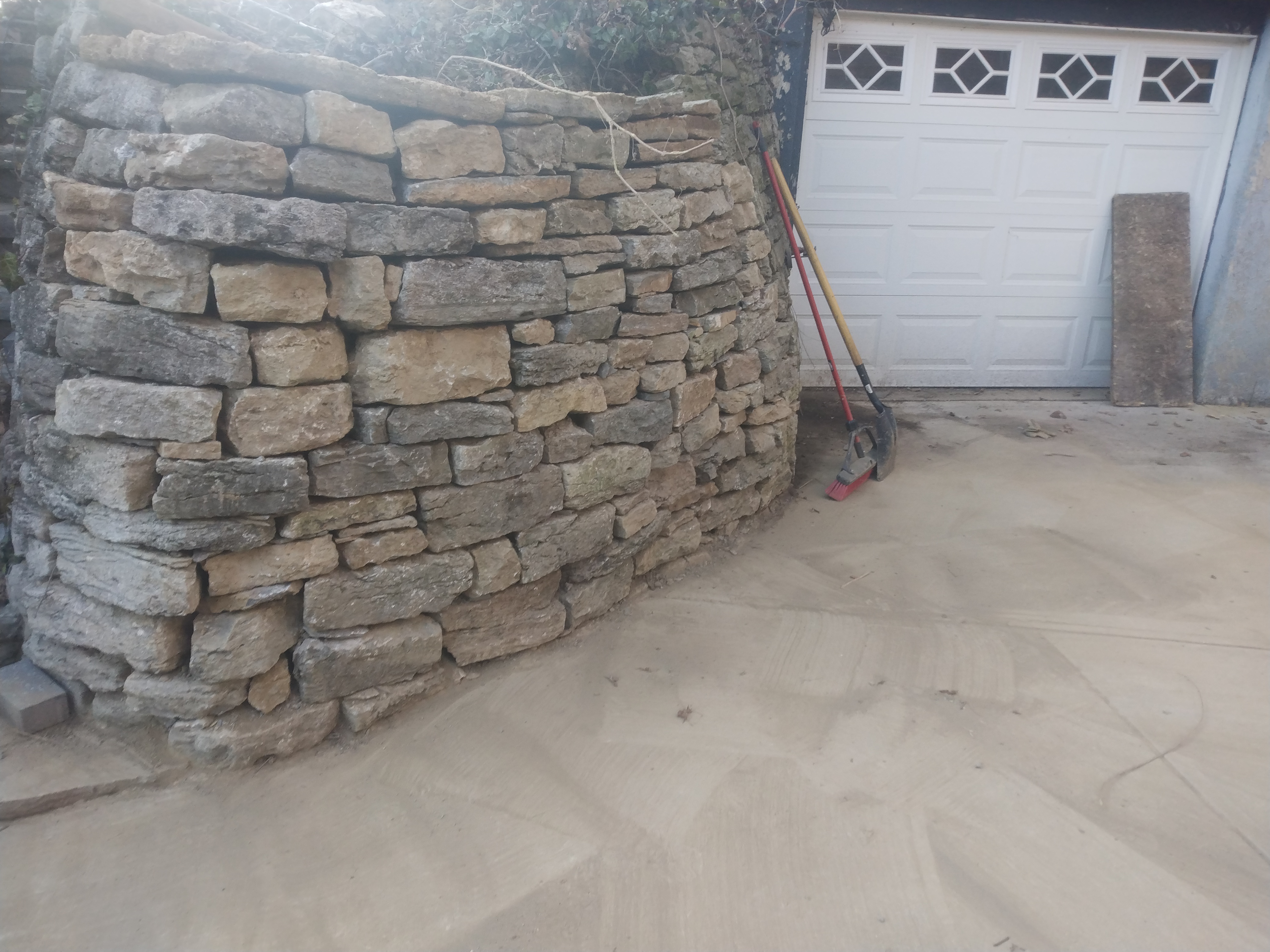 After: Restored Stone Wall